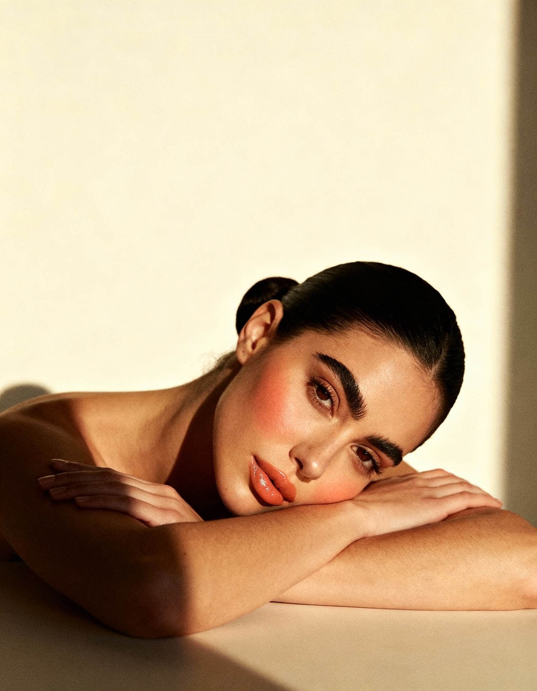 freepik__young-woman-resting-head-on-crossed-arms-sleek-dar__78371