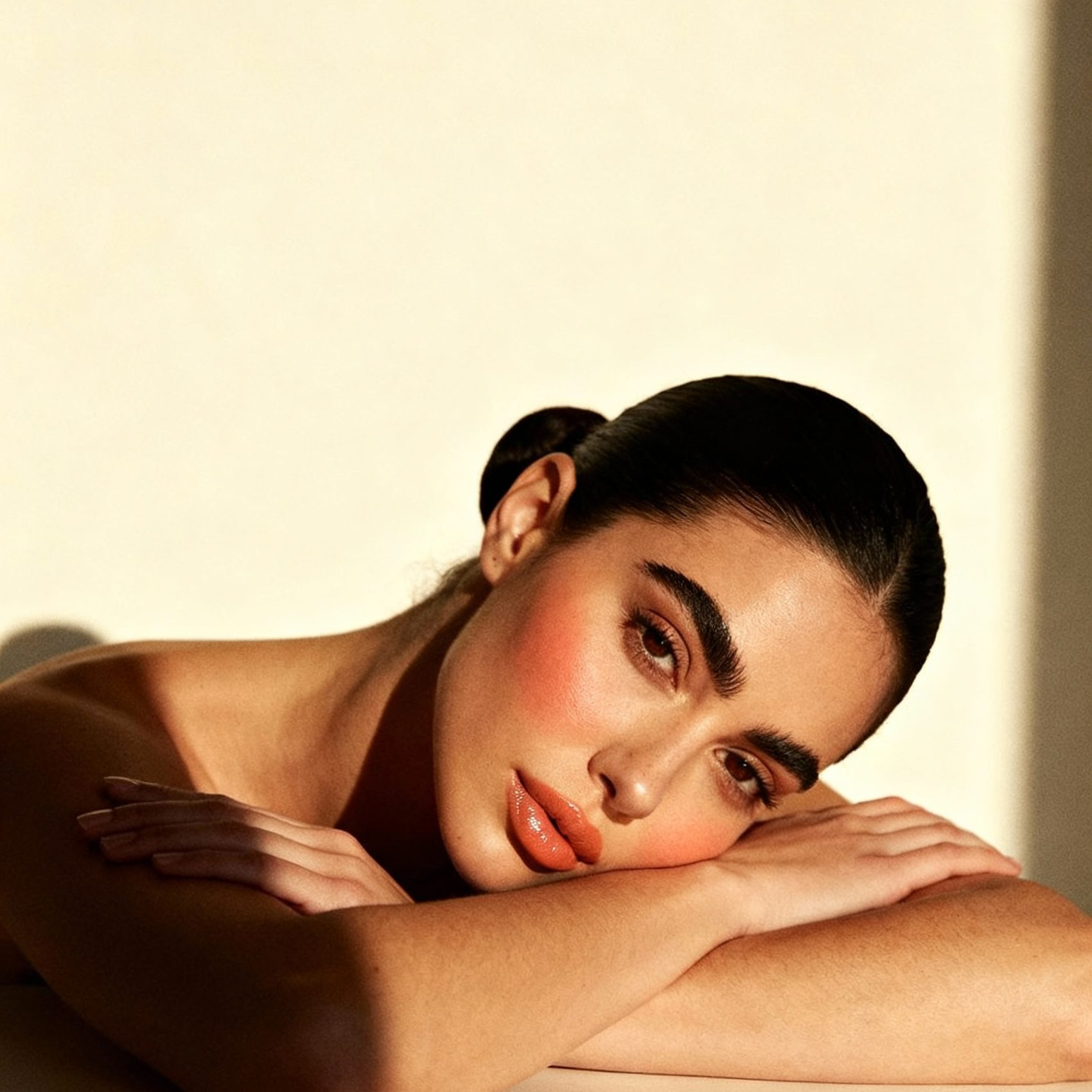 freepik__young-woman-resting-head-on-crossed-arms-sleek-dar__78371